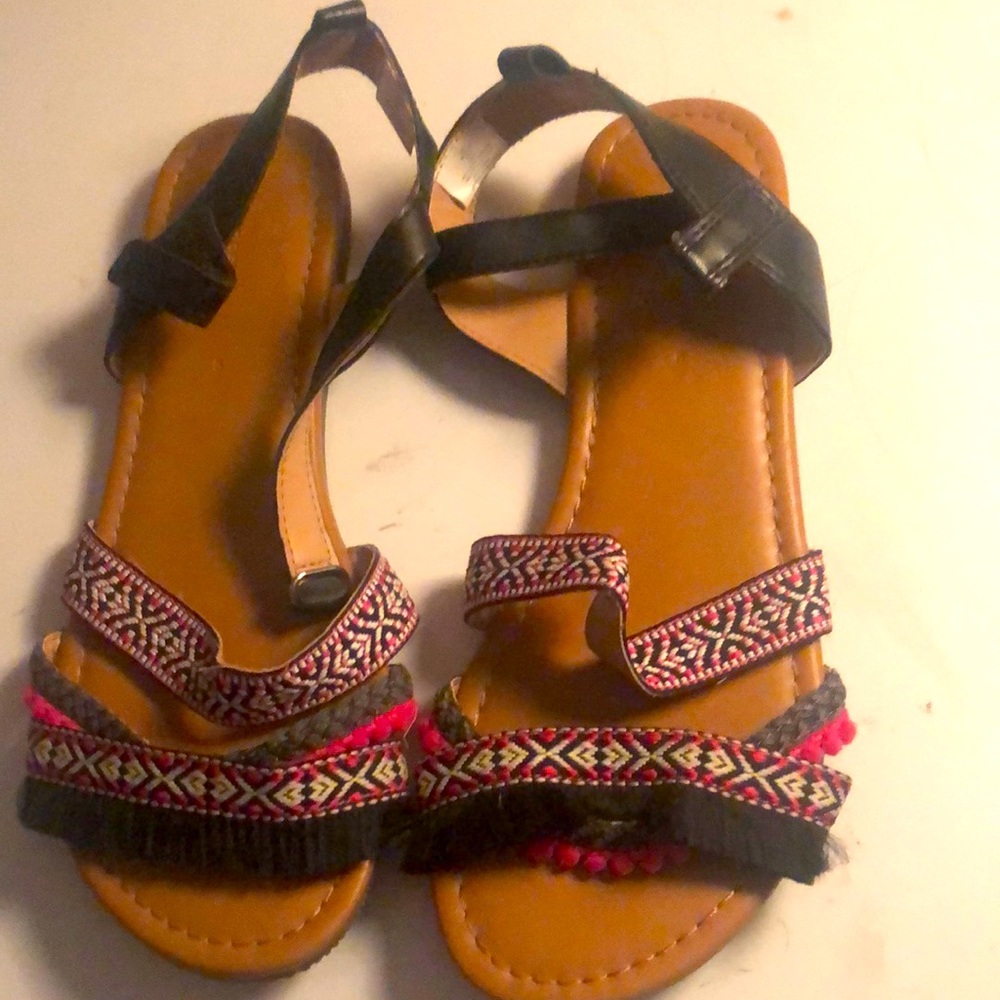 Never worn youth size 6 or women’s 8 sandals